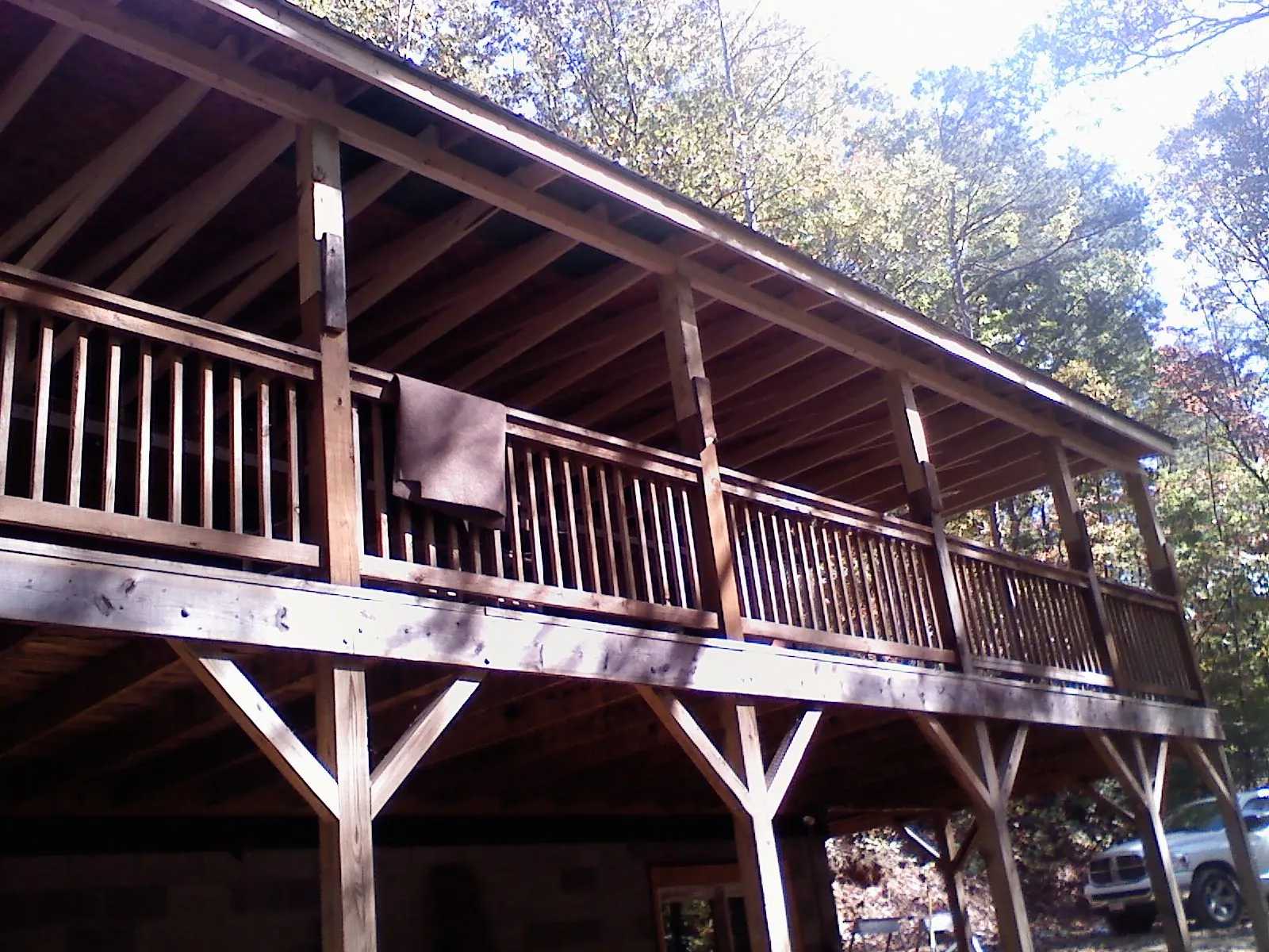 Timber framing under a new elevated porch and deck — Roof Leak Repair in Billings by Roofing Brothers